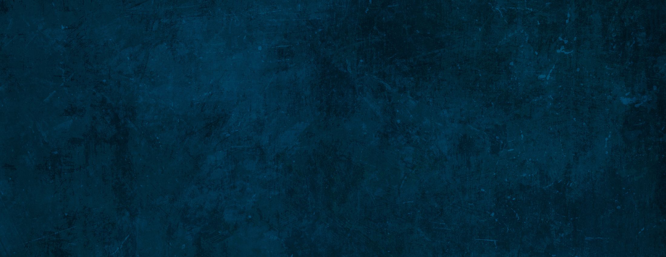 Dark textured background in deep blue color.