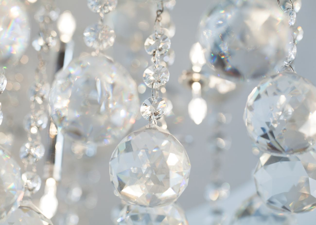 Close-up of shimmering crystal chandelier elements.